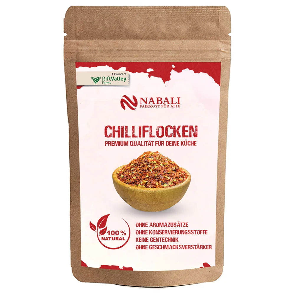 "Entdecken Sie Pul Biber Chiliflocken von Nabali Fairkost, nachhaltig angebaut und direkt aus Tunesien. Mit ihrem intensiven Aroma und der milden Schärfe verfeinern sie eine Vielzahl von Gerichten. Unsere fair gehandelten Gewürze werden in Kooperation mit Roots Natural sorgfältig verarbeitet und bieten höchste Qualität. Perfekt für Fleisch, Gemüse, Suppen und mehr – im praktischen wiederverschließbaren Beutel!"